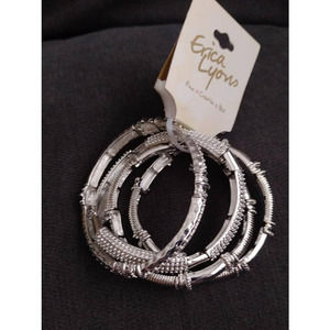 ERICA LYONS FOUR LAYERED BRACELETS